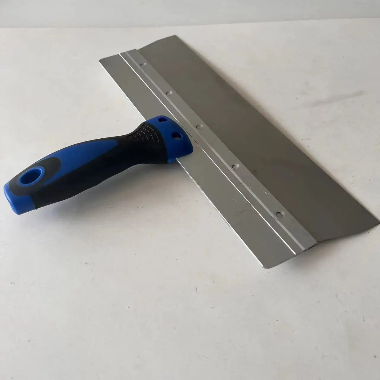 Taping Knives